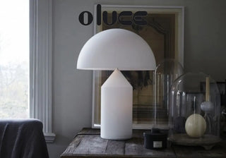 Explore OLuce's legacy in Italian lighting design, featuring iconic lamps like Atollo and Alba, elegance with innovative technology. Buy now on SHOPDECOR®