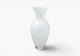 Enhance interiors with handcrafted glass vases, decorative centerpieces, and elegant Italian designs for contemporary living. Shop the look on ShopDecor