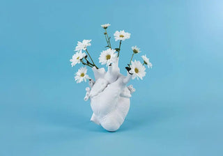 Discover Seletti’s Love In Bloom: heart vases in porcelain and glass, sculpted by Marcantonio to transform love into design. Buy now on SHOPDECOR®