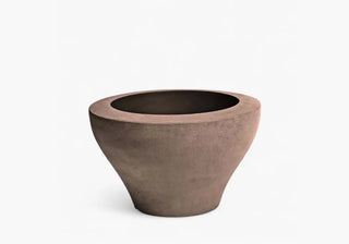 Explore the Ming collection by Rodolfo Dordoni for Serralunga: elegant outdoor vases and cachepots with sculptural appeal and modern finishes. | Get it on ShopDecor