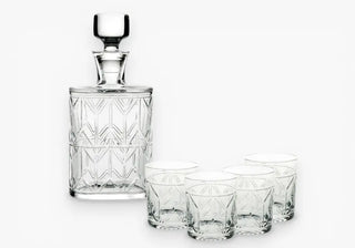 Refined barware with glasses, decanters, and ice buckets crafted to elevate drink service, enhancing sophisticated entertaining and modern hosting experiences.