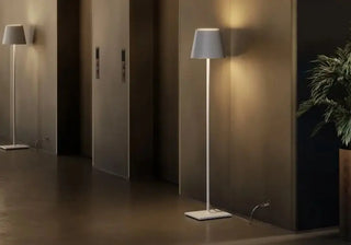 Upgrade your space with Zafferano Lampes à Porter—sophisticated dimmable floor lamps, stylish corner lights, and modern rechargeable designs.