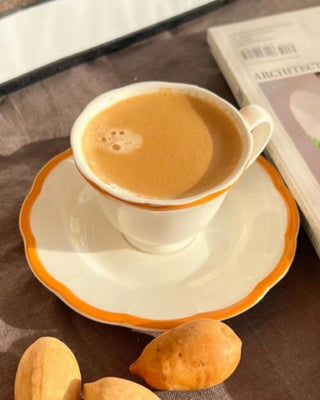 Bitossi Petalo coffee cup with saucer with scalloped rim - Buy now on ShopDecor - Discover the best products by BITOSSI HOME design