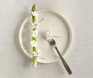 Elegant designer plates crafted for refined table settings, combining function, style, and timeless appeal.
