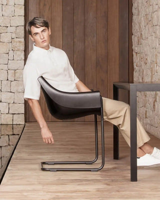 Vondom Manta Cantilever armchair with polypropylene seat and powder-coated metal cantilever base