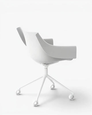 Vondom Manta swivel caster armchair with polypropylene shell and powder-coated metal four-star base