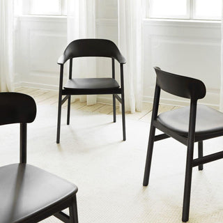 Normann Copenhagen Herit black polypropylene armchair with black oak legs - Buy now on ShopDecor - Discover the best products by NORMANN COPENHAGEN design