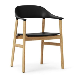 Normann Copenhagen Herit polypropylene armchair with oak legs Normann Copenhagen Herit Black - Buy now on ShopDecor - Discover the best products by NORMANN COPENHAGEN design