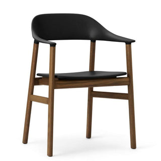 Normann Copenhagen Herit polypropylene armchair with smoked oak legs Normann Copenhagen Herit Black - Buy now on ShopDecor - Discover the best products by NORMANN COPENHAGEN design