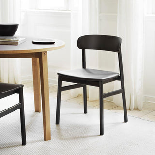 Normann Copenhagen Herit black polypropylene chair with black oak legs - Buy now on ShopDecor - Discover the best products by NORMANN COPENHAGEN design