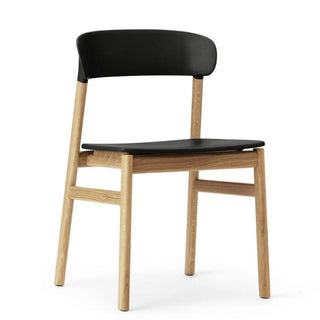 Normann Copenhagen Herit polypropylene chair with oak legs Normann Copenhagen Herit Black - Buy now on ShopDecor - Discover the best products by NORMANN COPENHAGEN design