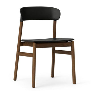 Normann Copenhagen Herit polypropylene chair with smoked oak legs Normann Copenhagen Herit Black - Buy now on ShopDecor - Discover the best products by NORMANN COPENHAGEN design