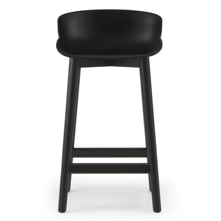 Normann Copenhagen Hyg black oak bar stool with polypropylene seat h. 65 cm. - Buy now on ShopDecor - Discover the best products by NORMANN COPENHAGEN design