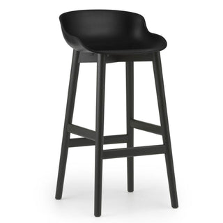 Normann Copenhagen Hyg black oak bar stool with polypropylene seat h. 75 cm. Normann Copenhagen Hyg Black - Buy now on ShopDecor - Discover the best products by NORMANN COPENHAGEN design