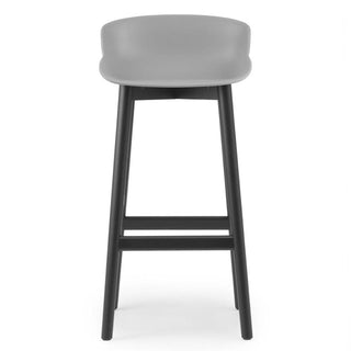 Normann Copenhagen Hyg black oak bar stool with polypropylene seat h. 75 cm. - Buy now on ShopDecor - Discover the best products by NORMANN COPENHAGEN design