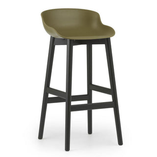 Normann Copenhagen Hyg black oak bar stool with polypropylene seat h. 75 cm. Normann Copenhagen Hyg Olive - Buy now on ShopDecor - Discover the best products by NORMANN COPENHAGEN design